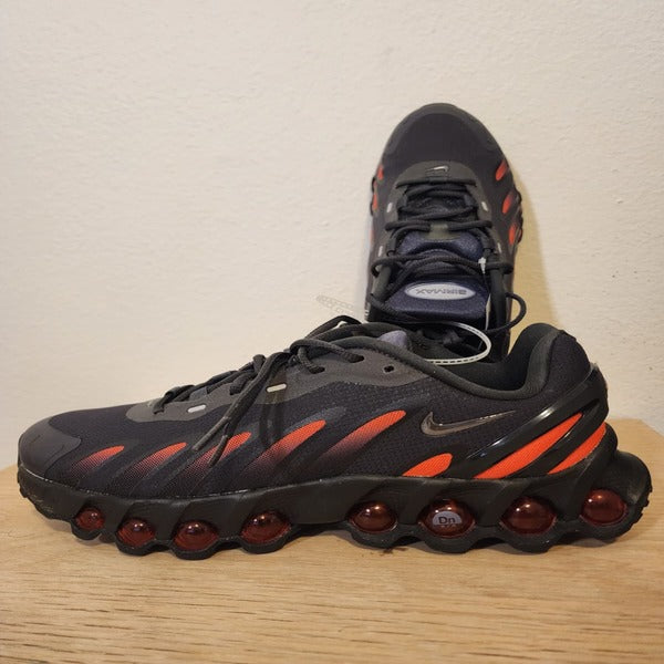Zapatillas Nike Air Max Dn – Innovación y Amortiguación Dinámica – Negro/Naranja