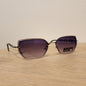 Lentes de Sol Guess Geométricos para Mujer –Montura de Cristal y Detalle de Cadena